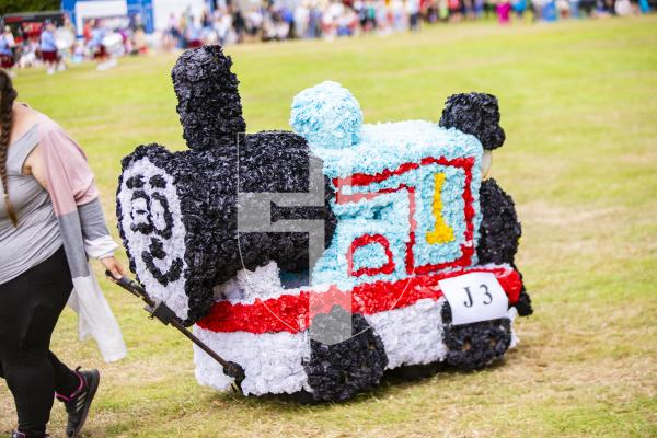 Picture by Sophie Rabey.  24-08-23.  North Show 2023, Battle of Flowers.
Class J - Paper flowers, wheeled, drawn or carried.  Occupied by children only under 10years.  Max floor area 25 soft with 2 adults to assist.
J3 Thomas The Tank Engine & Friends - Leah & Ester Peck with Lily May Peck