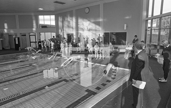 Picture by Guernsey Press.
Nostalgia Lookback feature.
22 Oct 1983. Neg number 2079/5/83.
In they go, as Deputy Bailiff Mr Graham Dorey (right) starts off the first teams of the Swimarathon at Beau Sejour.