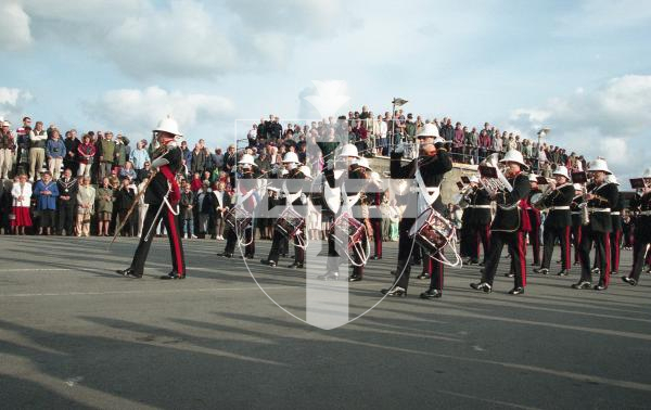 Picture by Guernsey Press.
Nostalgia Lookback feature.
5 Oct 1998. Neg number 2682/16/98.
Around 300 people lined the Albert Pier to watch and listen to the band of the Royal Marines, Plymouth, beat retreat. After half-an-hour of music and marching the salute was taken by Lt-Governor Sir John Coward.