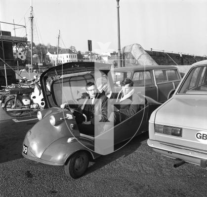 Picture by Guernsey Press. Nostalgia Lookback feature MONO. 
12 Feb 1971. Neg number 295/71.
Messerschmitt 109 owner John Foley takes the pilot's seat and motoring writer Sam Brown occupies the rear seat in the tandem cockpit of this unusual three-wheeler.