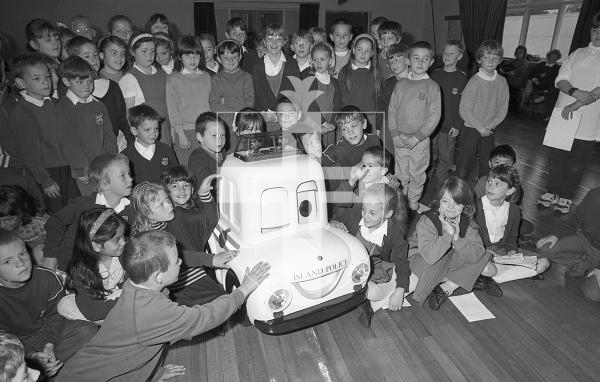 Picture by Guernsey Press. Nostalgia Lookback feature MONO. 
24 April 1993. Neg number 1355/15/93.
The model radio-controlled and speaking car which will be used by police to get messages over to children about road safety, solvent abuse or any other important issue. Amherst Junior School pupils were the first to see the car.