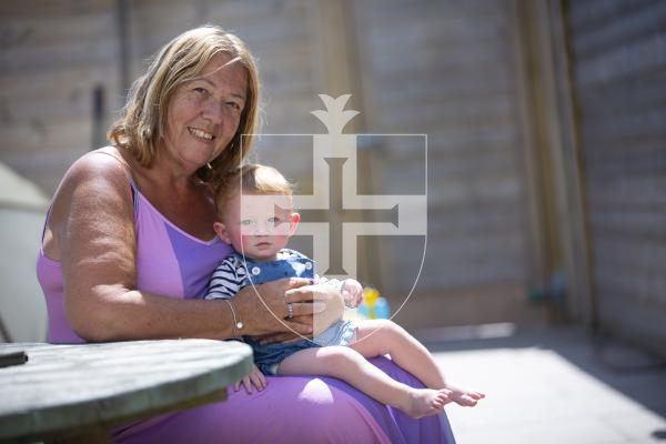 Picture By Peter Frankland. 18-07-23 Cheryl Harvey has been nominated for carer of the year. She is pictured with 13mth old Teddie Gauvain - one of many people she is caring for.