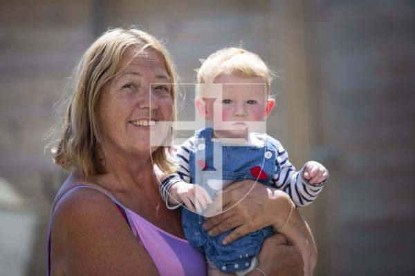 Picture By Peter Frankland. 18-07-23 Cheryl Harvey has been nominated for carer of the year. She is pictured with 13mth old Teddie Gauvain - one of many people she is caring for.
