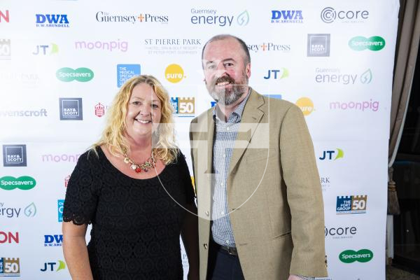 Picture by Peter Frankland. 07-10-23 Pride of Guernsey Awards 2023.  Bailiwick Community Hero:
Sally Dawber (representing Jim Phillips) and Will Annan (Fort Group)