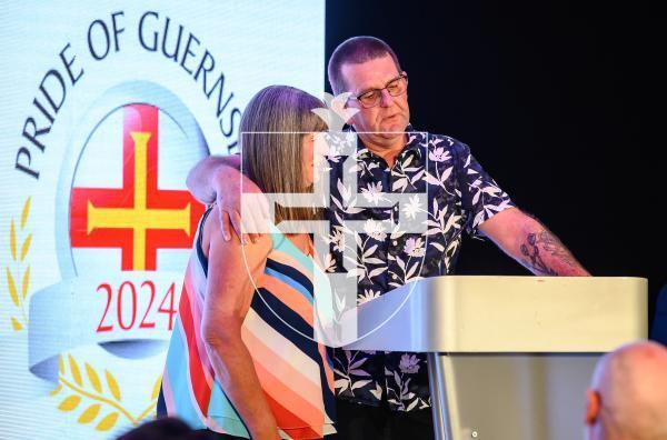 Pic supplied by Andrew Le Poidevin, 19-10-2024. The 2024 Guernsey Press Pride of Guernsey Awards night at St Pierre Park Hotel.
Grandparents of the Year Award sponsored by Channel Islands Co-op.
Presented by Mark Cox.
Winners Ann & Andy Fallaize.