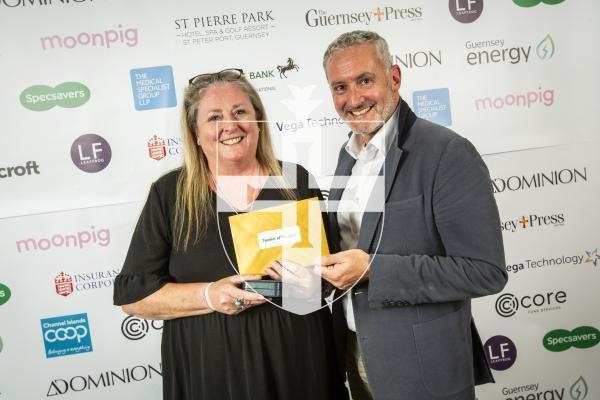 Picture by Sophie Rabey.  19-10-24.  Guernsey Press Pride of Guernsey Awards 2024 at St Pierre Park.
Teacher of the Year sponsored by Core Fund Services.  L-R Kiera Vaudin (Winner) and Martin Scott (Sponsor).