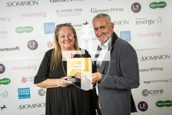 Picture by Sophie Rabey.  19-10-24.  Guernsey Press Pride of Guernsey Awards 2024 at St Pierre Park.
Teacher of the Year sponsored by Core Fund Services.  L-R Kiera Vaudin (Winner) and Martin Scott (Sponsor).