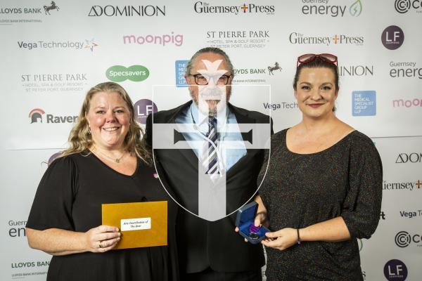 Picture by Sophie Rabey.  19-10-24.  Guernsey Press Pride of Guernsey Awards 2024 at St Pierre Park.
Arts Contribution of the Year sponsored by The Guernsey Press.  L-R Claire Dawson from Guernsey Street Festival (Winner), Simon De La Rue (Sponsor) and Lydia Sullivan-Pugh from Guernsey Street Festival (Winner).