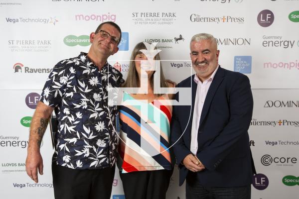 Picture by Sophie Rabey.  19-10-24.  Guernsey Press Pride of Guernsey Awards 2024 at St Pierre Park.
Grandparent/s of the Year sponsored by Channel Islands Co-operative Society.  L-R Andy and Ann Fallaize (Winners) and Mark Cox (Sponsor).