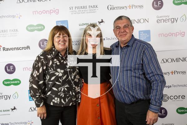 Picture by Sophie Rabey.  19-10-24.  Guernsey Press Pride of Guernsey Awards 2024 at St Pierre Park.
Parent/s of the Year sponsored by Leapfrog.  L-R Maria Cosgrove (winner), Vicki Eppelein (Sponsor) and Shane Cosgrove (winner).