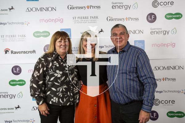 Picture by Sophie Rabey.  19-10-24.  Guernsey Press Pride of Guernsey Awards 2024 at St Pierre Park.
Parent/s of the Year sponsored by Leapfrog.  L-R Maria Cosgrove (winner), Vicki Eppelein (Sponsor) and Shane Cosgrove (winner).