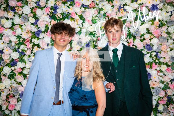 Picture by Luke Le Prevost. 29-06-23.Grammar School Yr 11 Prom 2023 at The Farmhouse. L-R Cayden Tardif, 16, Ms Theresa Garn and Harry Hodgson, 16