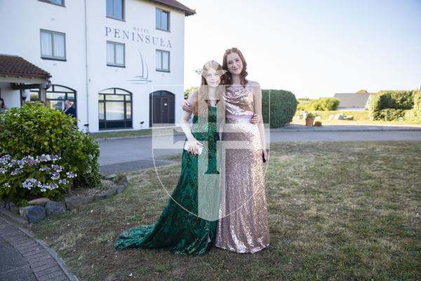 Picture By Peter Frankland. 06-07-23 St. Sampson's High Prom at Peninsula Hotel. L-R - Charlotte Goddard and Nicolle Heaume.