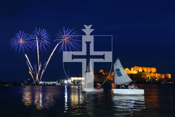 Pic by Adrian Miller 15-06-18   
Model Yacht Pond / Castle Cornet
24 hour sailing challenge event with fireworks from Round Table Harbour Carnival in the background.
Ady Picture of the Month
I was sent to cover the 24 hour sailing challenge at the model yacht pond fortunately it coincided with the Harbour Carnival's firework display,I was pleased with the result and love the reflections.