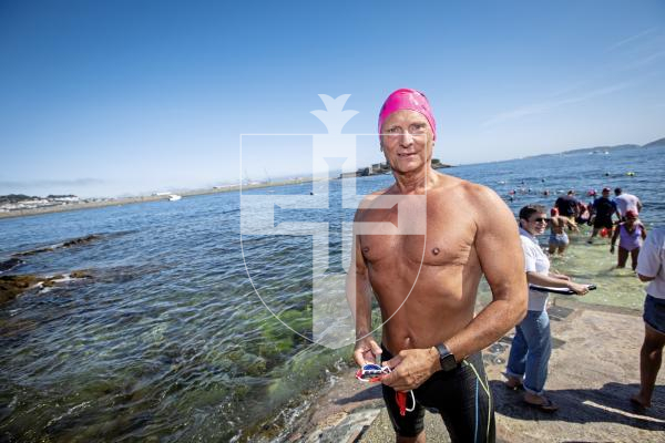 Picture by Peter Frankland. 11-08-24 Hundreds of people turned out on a warm day to take on the Guernsey Swimming Club's Castle Swim. Rene Brun.