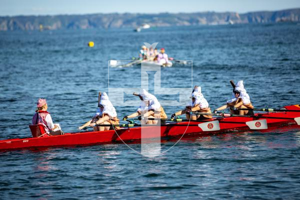 Picture by Karl Dorfner. 14-09-2024 - Pictures from the Belle Greve Bay Rowing race, where some teams raced in fancy dress, featuring a smurf team, super heros, and last years winners dressed as ice cream cones which involved using duvets for the ice cream!