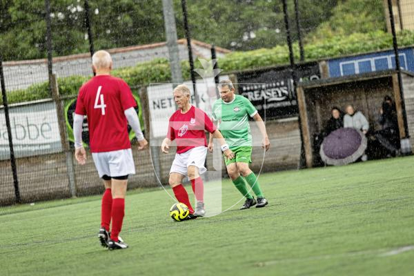 Picture by Sophie Rabey.  06-06-25.  Walking Football at KGV.  Guernsey Select vs England 0ver75s.