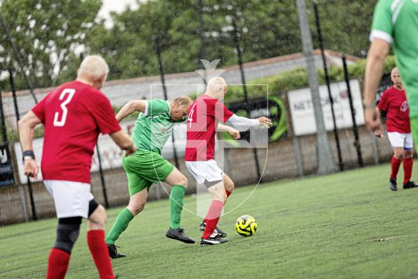 Picture by Sophie Rabey.  06-06-25.  Walking Football at KGV.  Guernsey Select vs England 0ver75s.