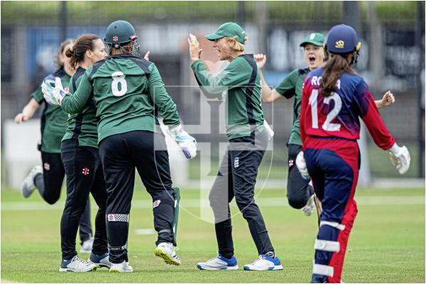 Guernsey high five the opening wicket of Maria Da Rocha