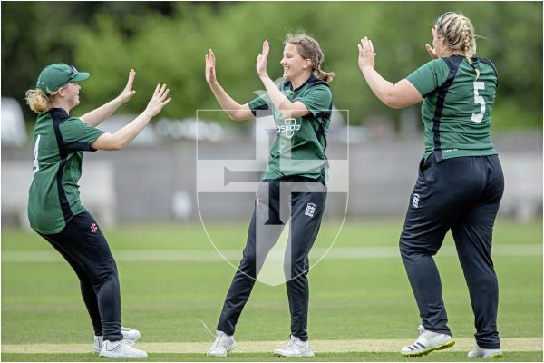 High Fives for Molly Robinson's fist wicket with Eva Bourgaize and Rachel Merrien