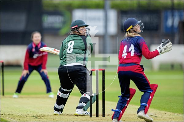 Krista De La Mare slices  to third man