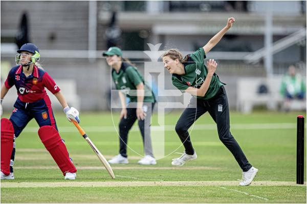Molly Robinson bowling from the DeBeauvoir End