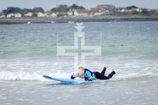 Picture by Sophie Rabey.  20-09-25.   Healing Waves, a Jersey bases Ocean Therapy Centre, are over again in Guernsey to host adaptive surfing sessions.
Blake Le Ber enjoying time out on the water.