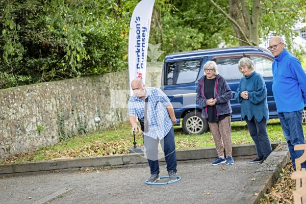 Picture by Sophie Rabey.  10-10-25.  Parkinsons Guernsey held a Petanque Session at the college field for people to give the game a go.
L-R Andrew Bisson(throwing), Sue Whitlock, Heather McGhee and William Mayer.