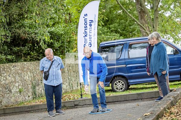 Picture by Sophie Rabey.  10-10-25.  Parkinsons Guernsey held a Petanque Session at the college field for people to give the game a go.
L-R Andrew Bisson, William Mayer (throwing), Sue Whitlock and Heather McGhee.