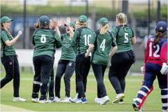 Guernsey celebrate the opening wicket of Maria Da Rocha