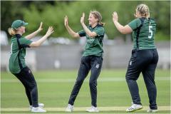 High Fives for Molly Robinson's fist wicket with Eva Bourgaize and Rachel Merrien