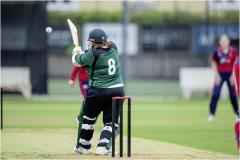 Krista De La Mare pulls to the legside boundary