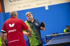 Picture by Peter Frankland. 13-09-24 Table Tennis - Veterans Home Nations 2024 Championships. O60s player Tim Le Page shakes hand with his Jersey opponent.