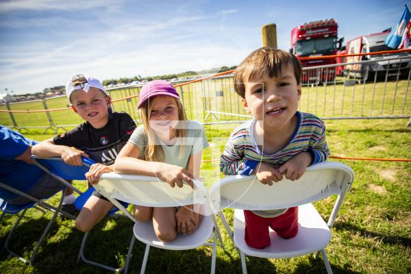 Picture by Sophie Rabey.  16-08-23.   West Show 2023.  
Jackson Le Tocq (8), Harper Le Tocq (6) and Corey Winter (4) enjoying the entertainment.