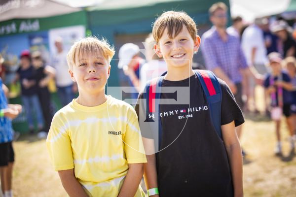 Picture by Sophie Rabey.  17-08-23.   West Show 2023.  Day 2 of activities and fun in the sun.
School friends L-R Noah Marquand (aged 12) and Juris Le Cras (aged 12)